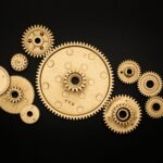 photo of golden cogwheel on black background